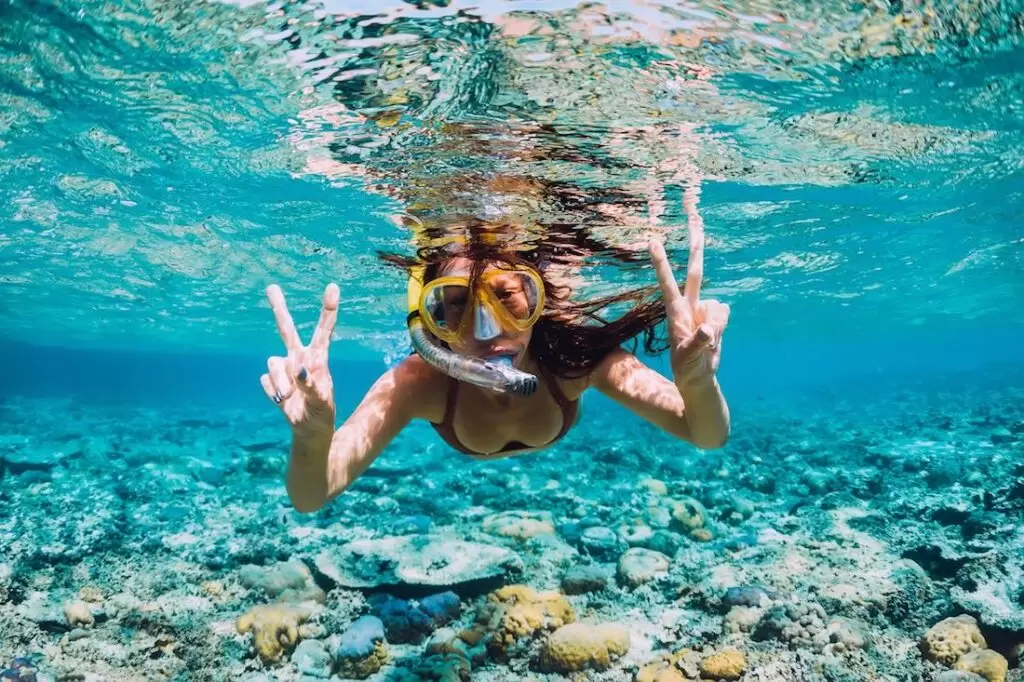 A photo of girl snorkeling